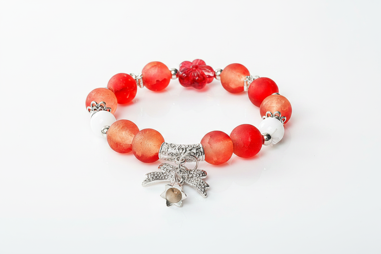 Bracelet perles rouges nœud papillon